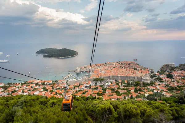 Experience the charming cable car ride to Srđ, offering spectacular panoramic views of Dubrovnik